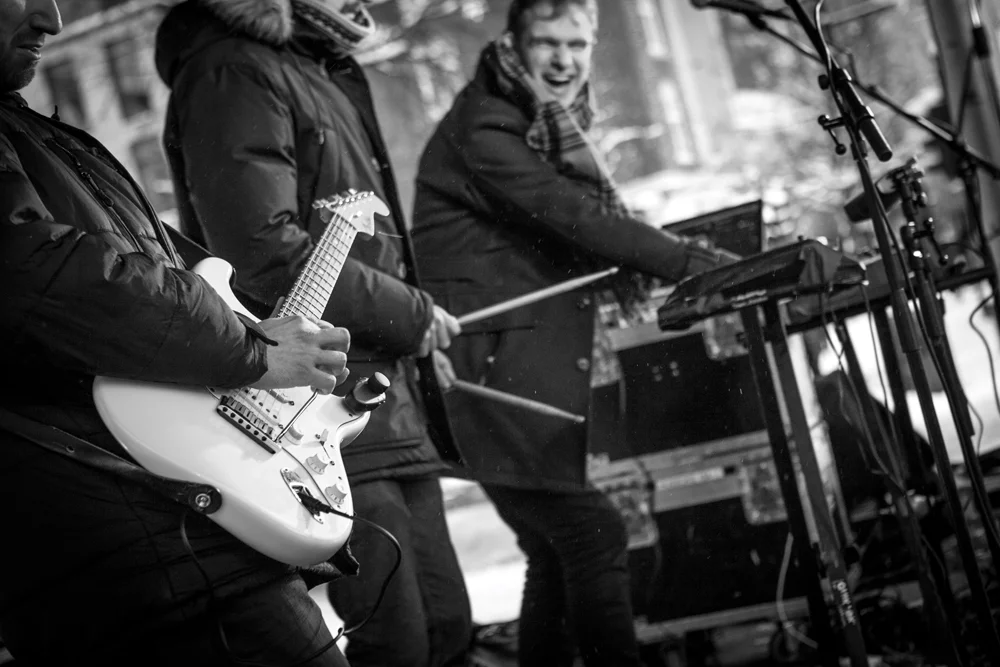 The setup allows a player freedom to move around the stage and still activate and control the stationary stomp effects pedal wired up to the pedalboard or rack