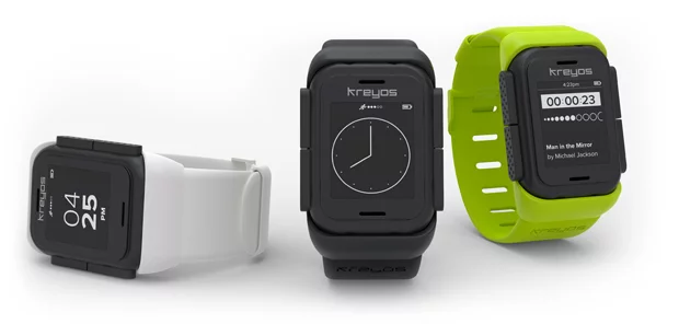 Some of the different watch face designs offered on the Kreyos Meteor, shown here attached to the wrist strap