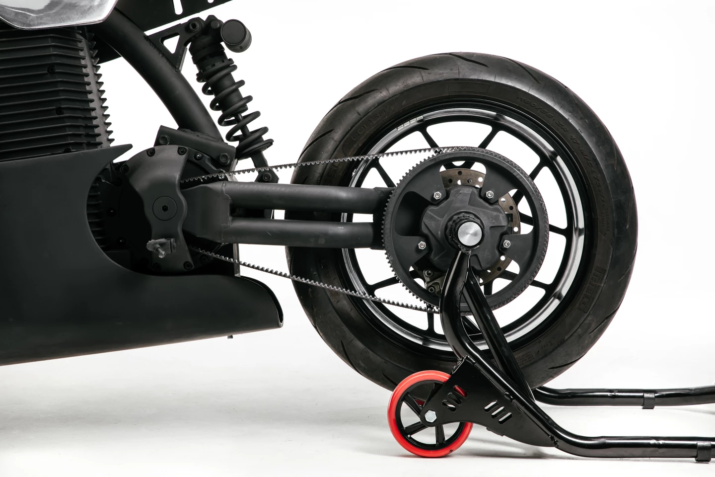 Twin tube single sided swingarm and carbon belt drive look trick