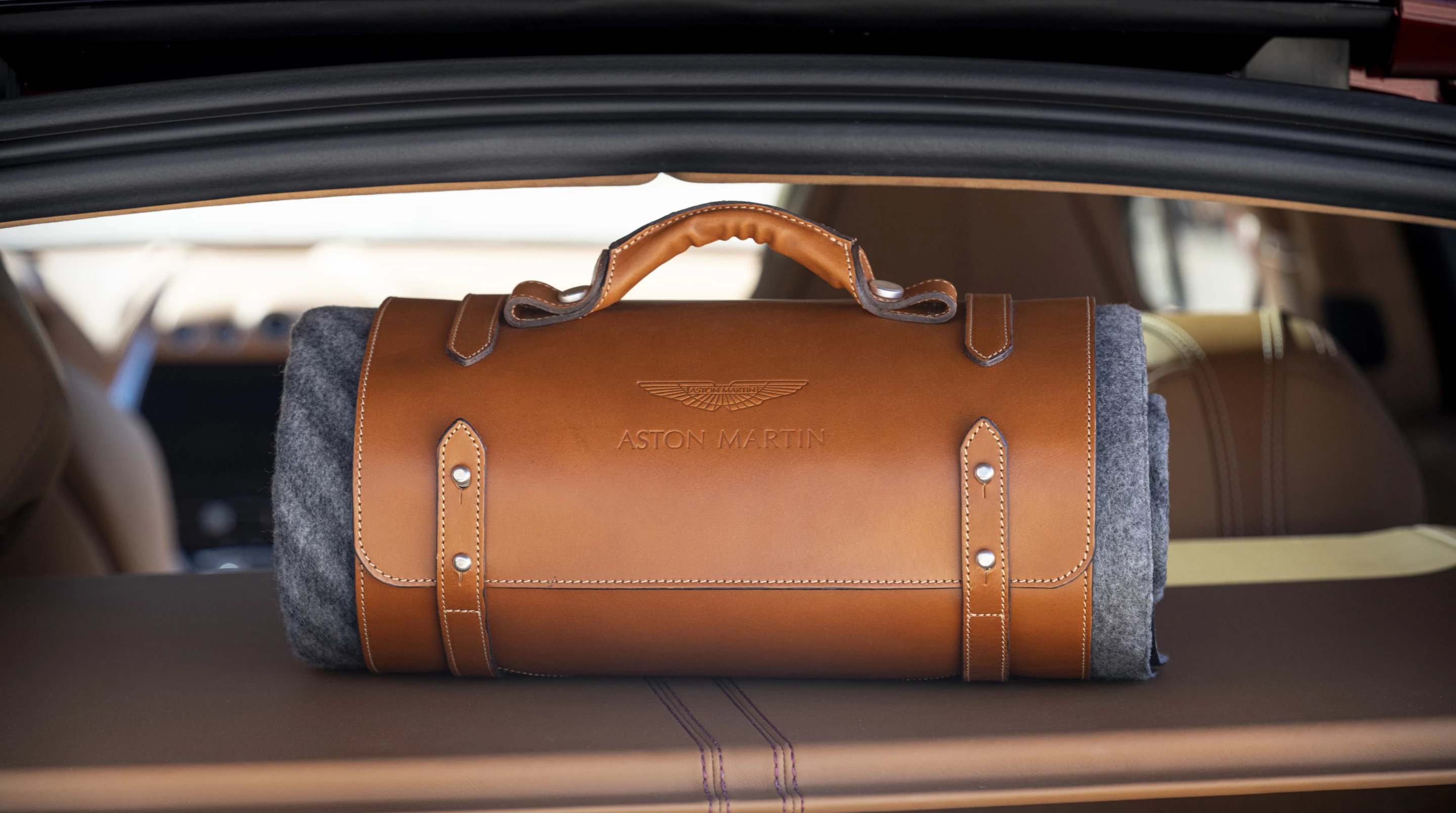 This leather-bound picnic blanket is another available accessory for the Aston Martin DBX