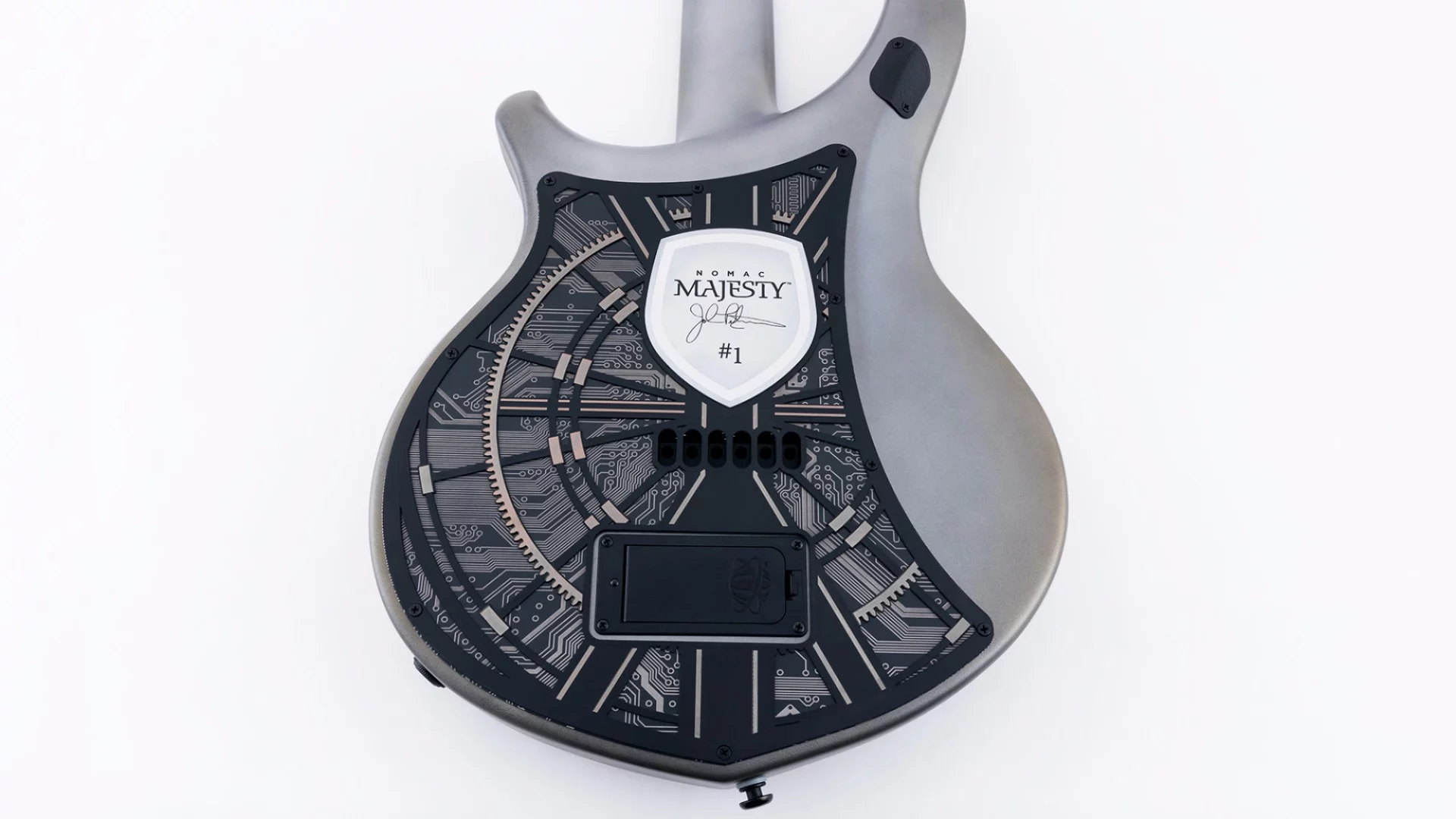 There's an enumerated backplate to the rear of the Nomac Majesty, set against a large circuit board design