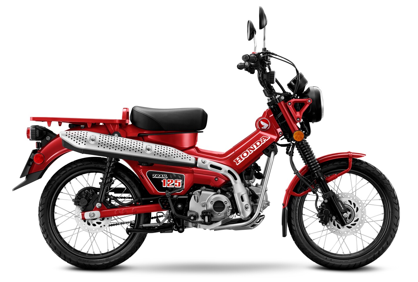 Rubber fork gaiters and perforated covers over the high-mount exhaust give it a touch of the scrambler vibe