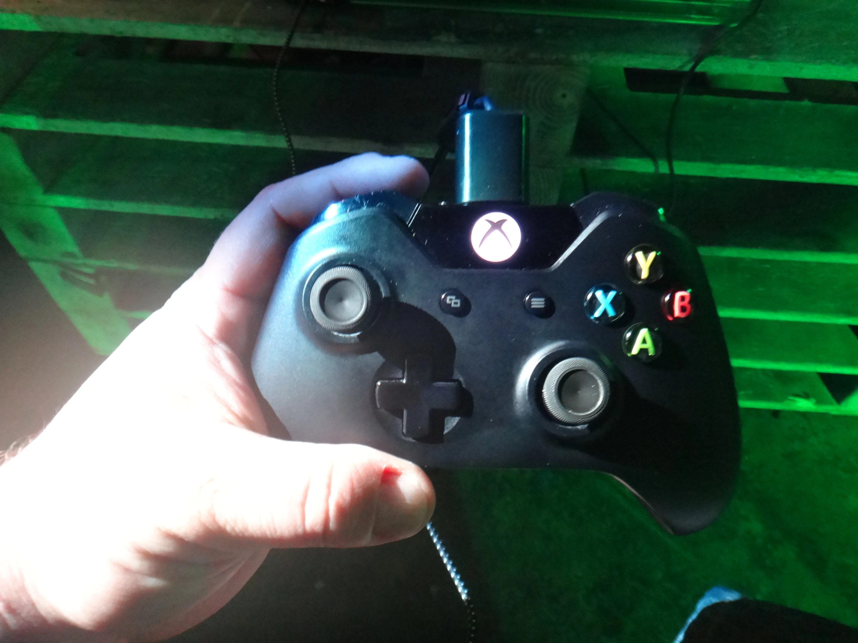 The two thumbsticks have been redesigned so they're easier to grip, and the disc-like D-pad has been replaced with a cross-shaped one that seems much more precise