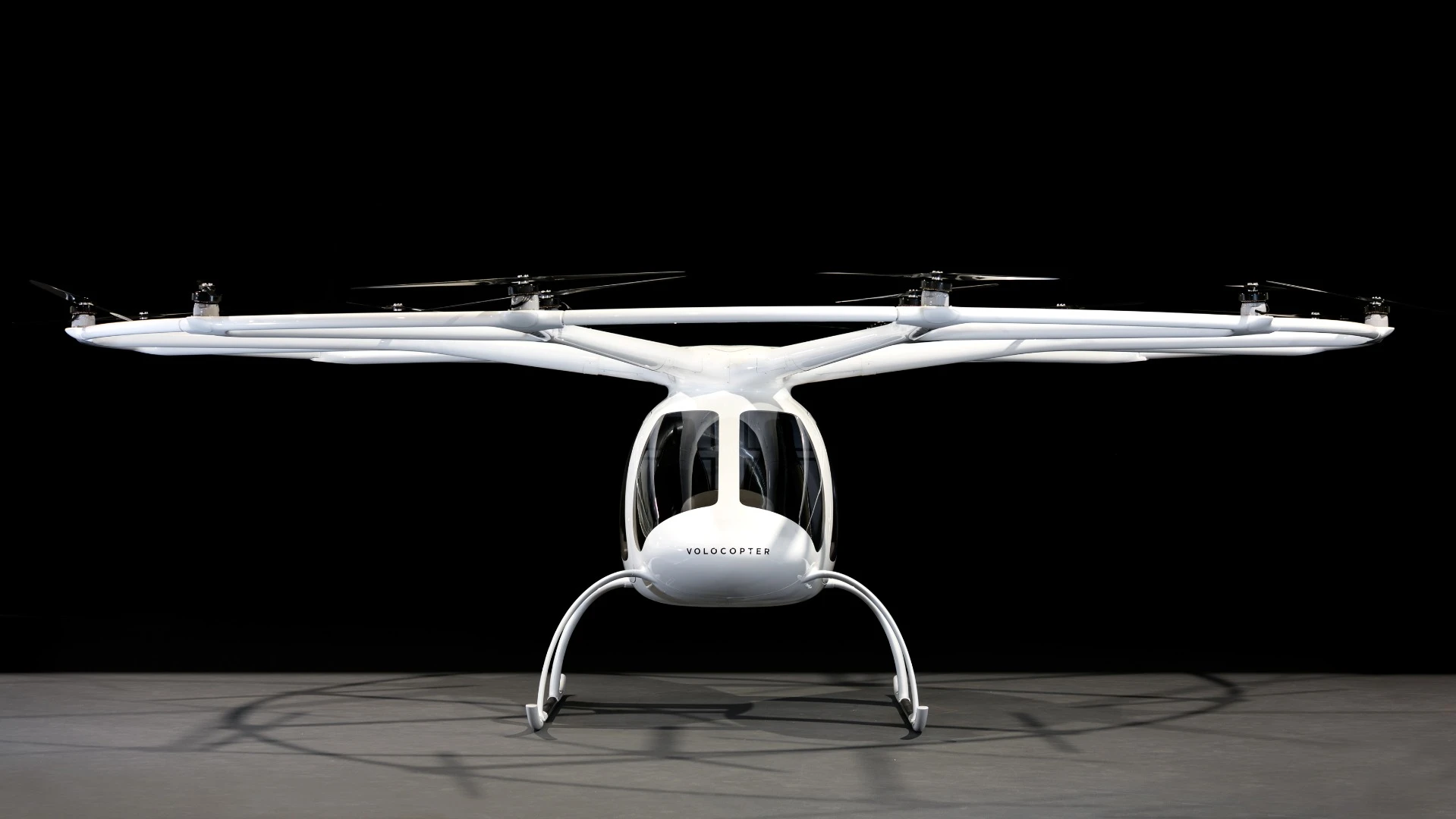 The Volocopter 2 is an all-electric aerial mobility machine that takes up to two passengers from point A to point B without a pilot