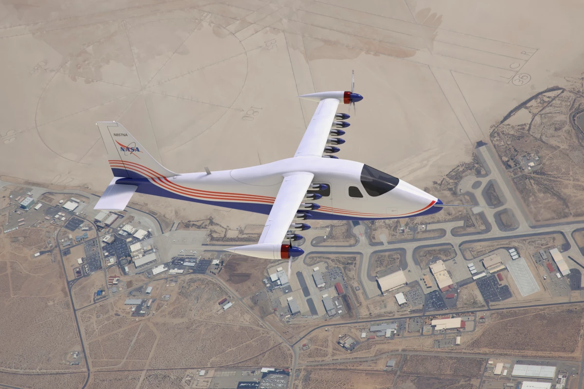 This artist’s concept image shows NASA’s first all-electric X-plane, the X-57 Maxwell, in its final configuration, flying in cruise mode over NASA’s Armstrong Flight Research Center in Edwards, California