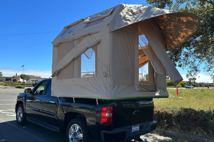 Camp on your truck, on the ground or even on the water