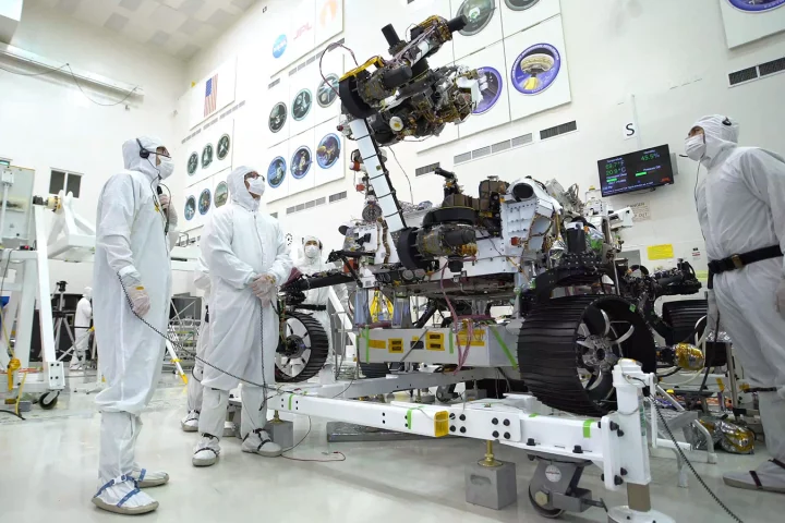 The rover's 7-ft-(2.1-m) arm maneuvers its 88-lb (40-kg) sensor-laden turret as it moves from a deployed to a stowed configuration