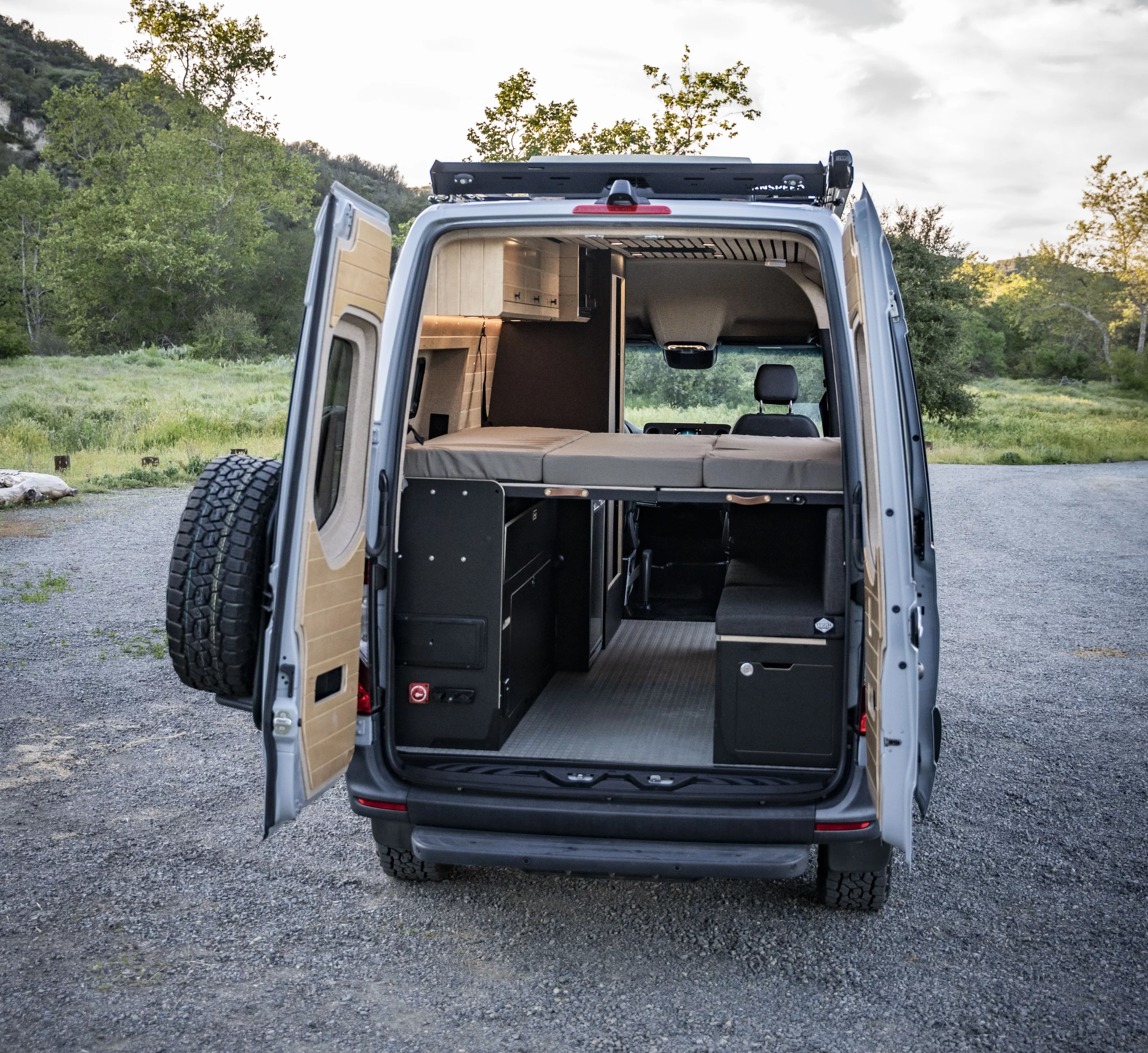 The fold-out Murphy bed extends over the dining lounge with its own foundational supports