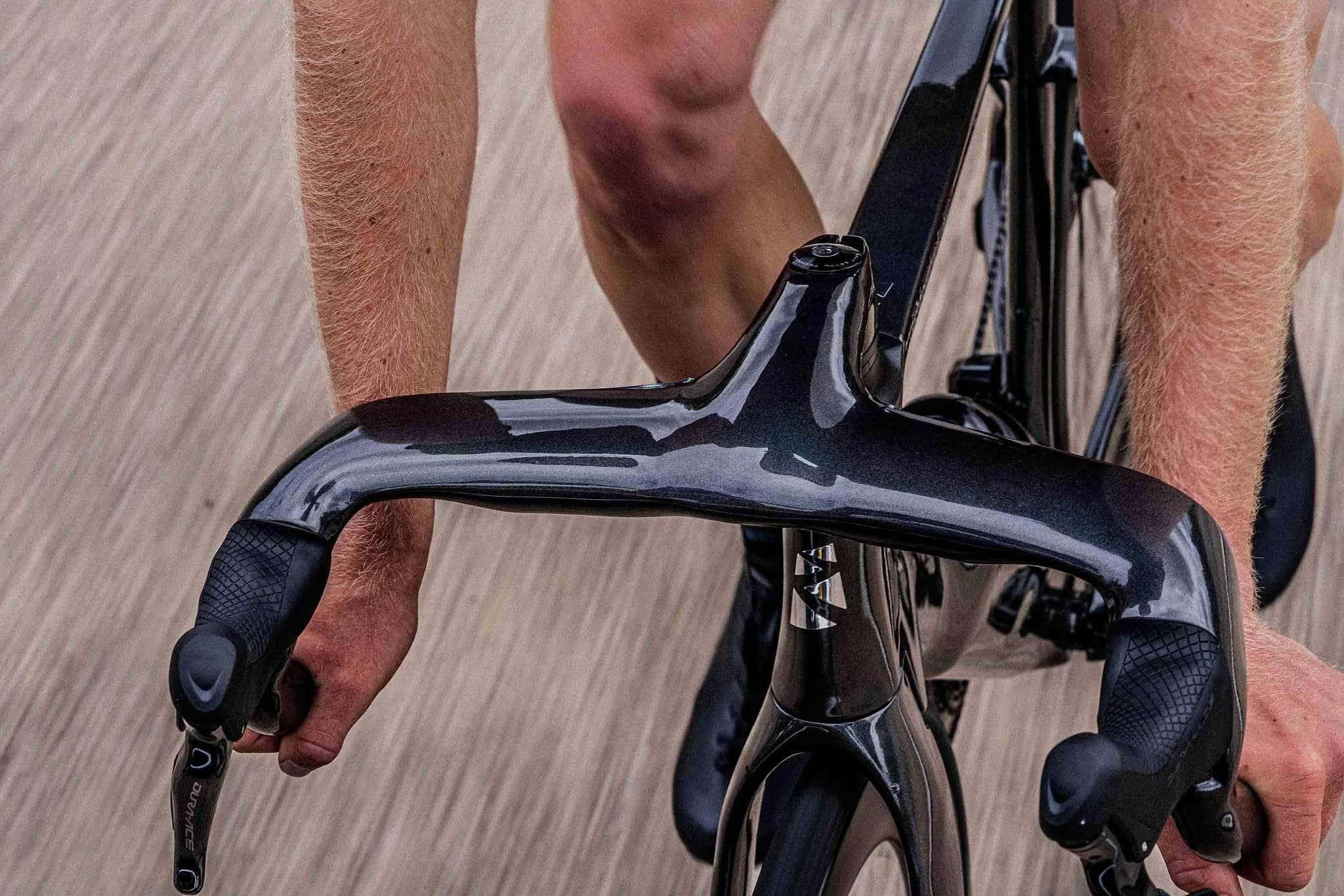 The extra mass of the weight generators seems counterintuitive at first, but they serve to direct air around the rider and cut overall drag