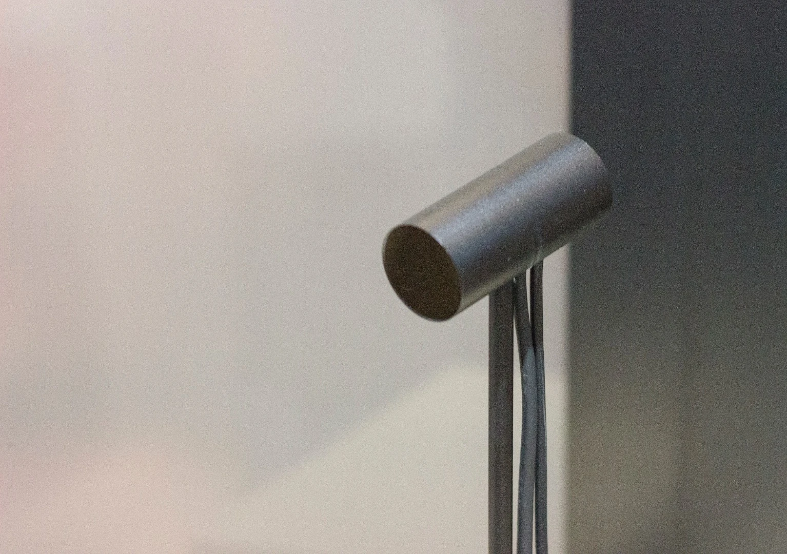 The lone motion sensor, that you'll prop on your desk (or mount on the wall)