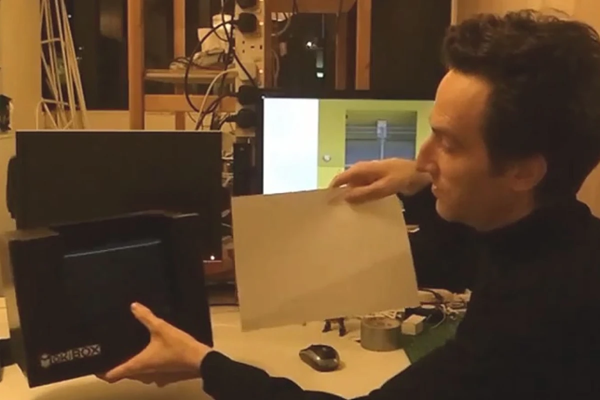 MakiBox designer Jon Buford shows off the 3D printer's compact size