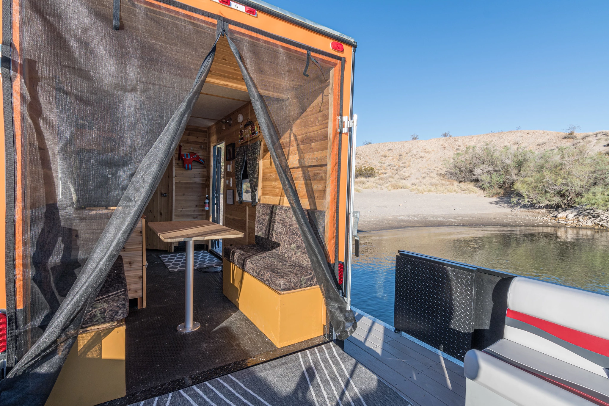 The Heidi-Ho's living/dining area has a removable mosquito net