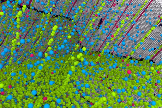 A model of the atomic structure of the silver grains, full of copper impurities (green) that line themselves up inside defects