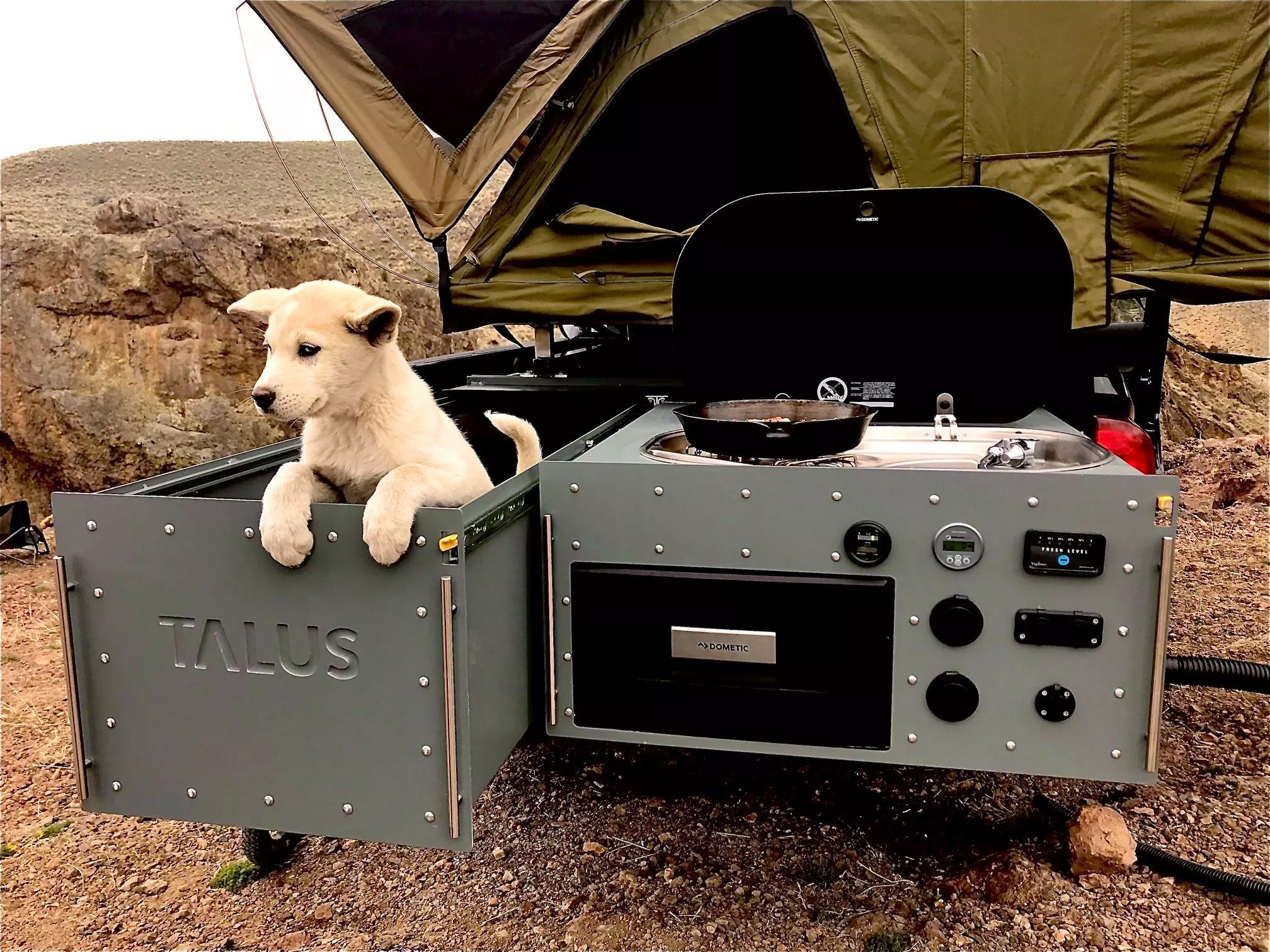 The large cargo drawer on the left can fit all kinds of camping essentials ...