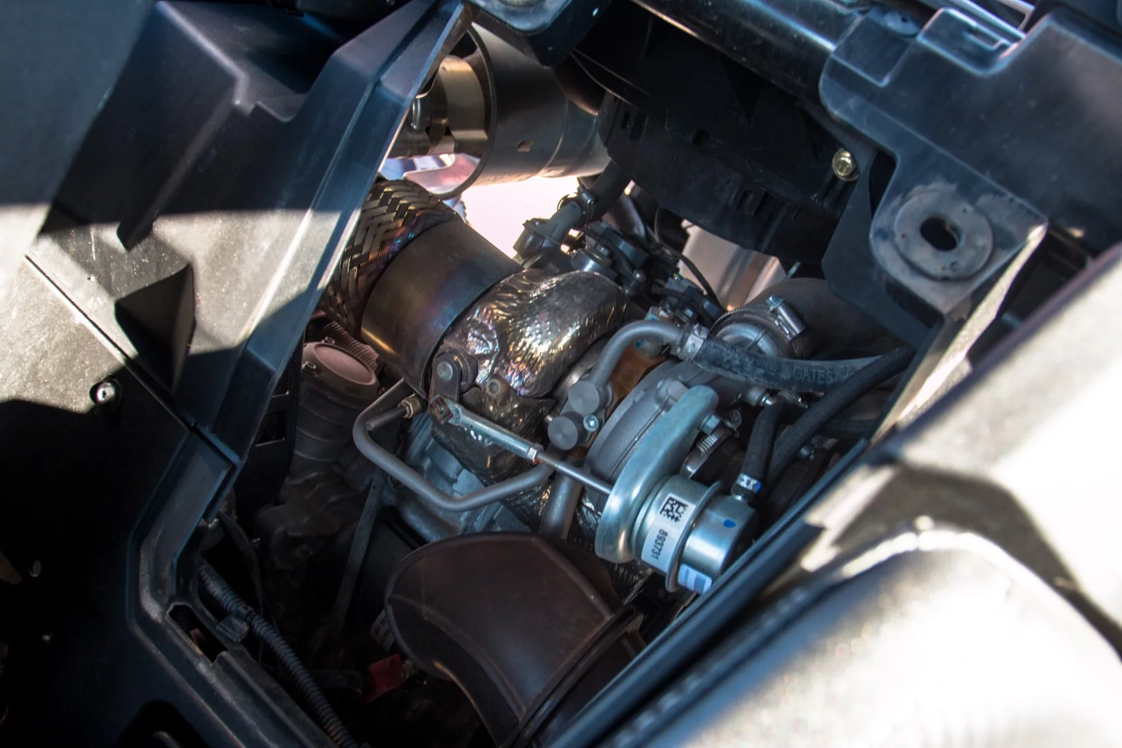 A quick peek at the actual turbo of a Can Am Maverick X3 X DS Turbo. It spins around 3,000 rpm at sea level and as high as 6,000 rpm at higher altitudes to produce around 4 psi of boost
