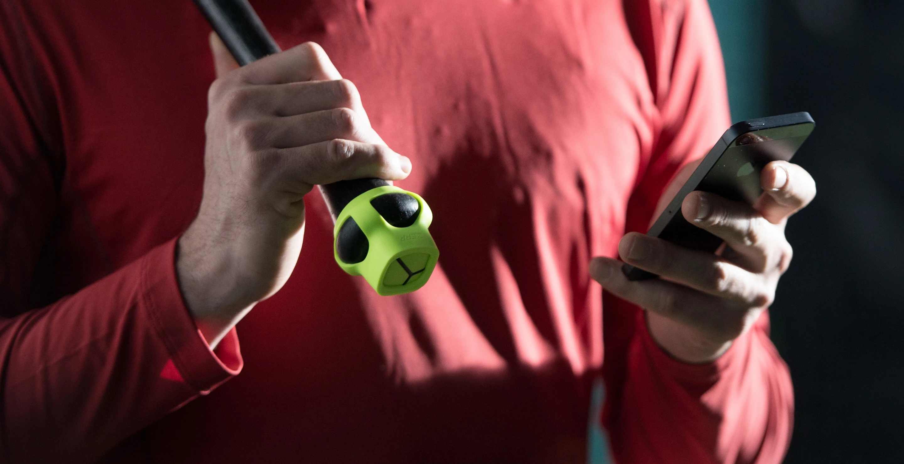 The Zepp Baseball sensor attaches to the bat handle