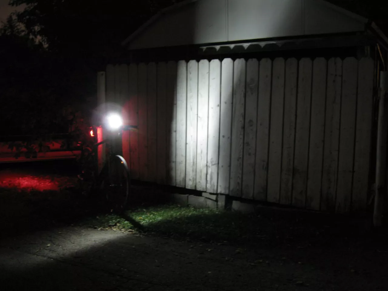 The Defender is highly visible from the front, producing a bar of light on the road perpendicular to the bike's front wheel