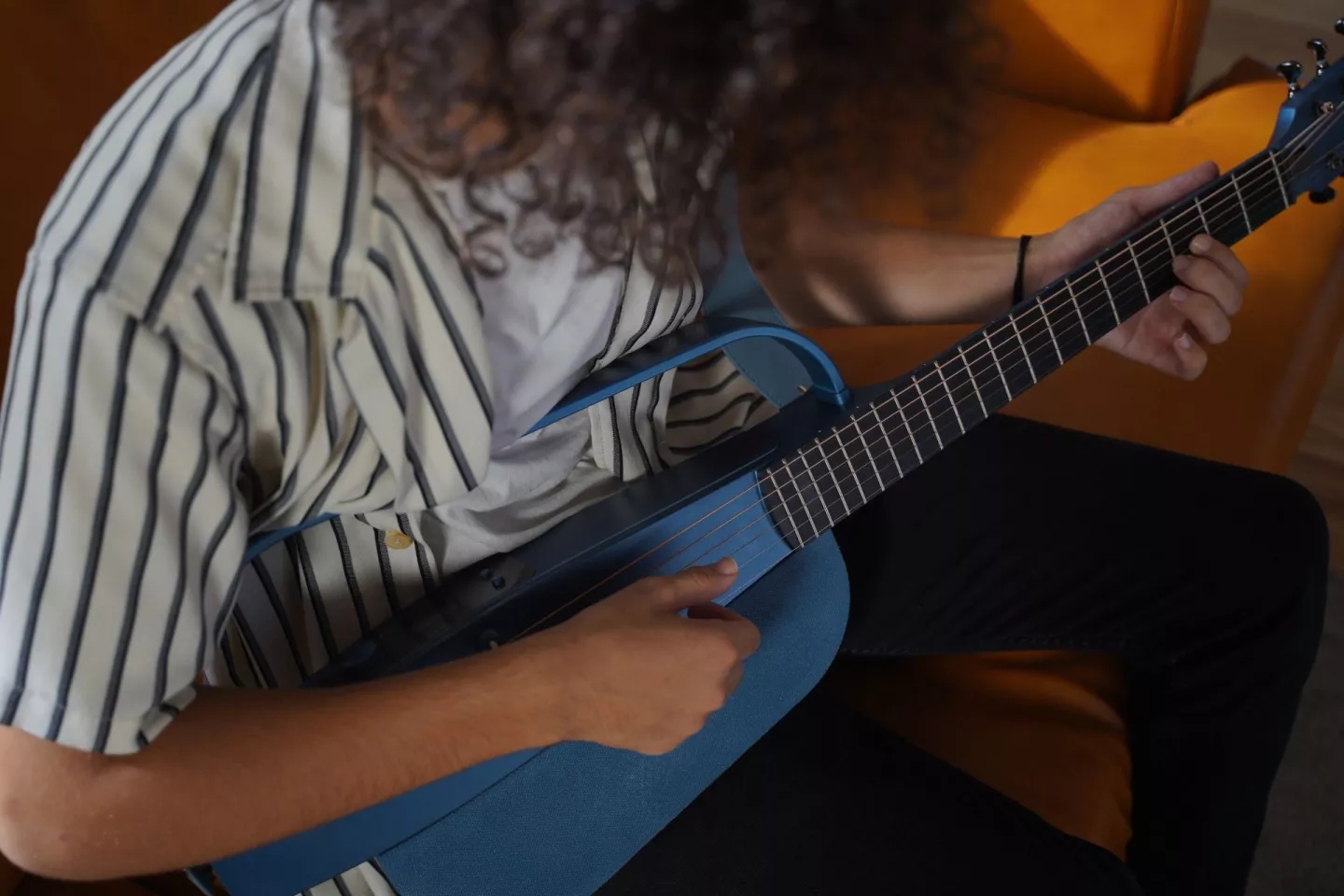 The lower section of the Nexg smart guitar is home to a 50-W sound system comprising a woofer and two tweeters