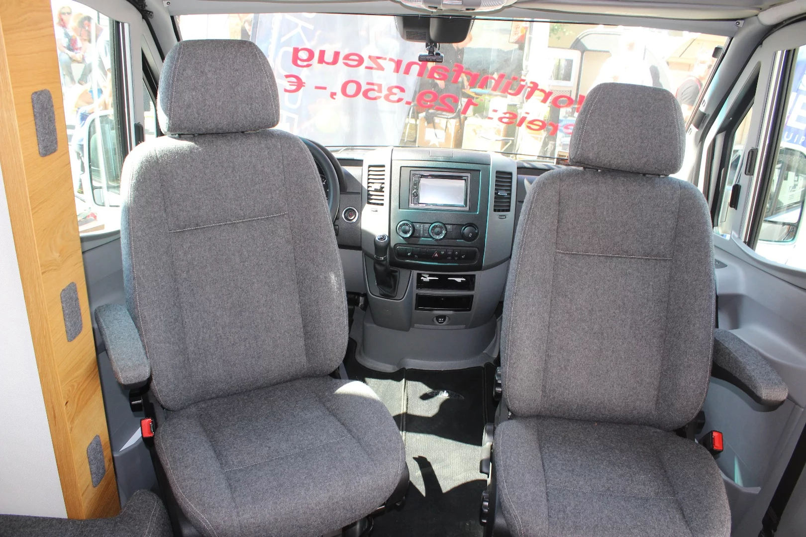 Swivel seat inside the Huenerkopf Sprinter camper
