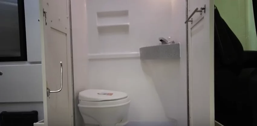 The Roadtrek layout includes a bathroom