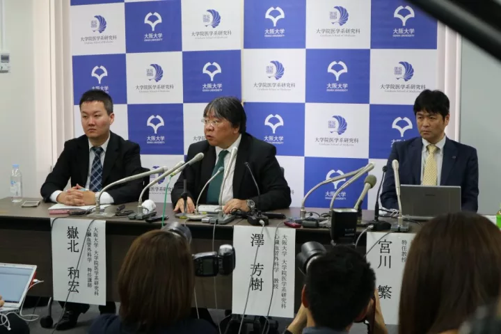 Professor Yoshiki Sawa, center, has pioneered a new induced pluripotent stem cell therapy for treating damaged hearts