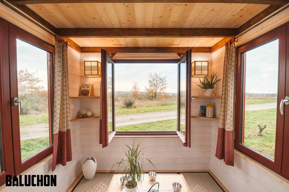 The Ondine's living room area is light-filled thanks to three large windows