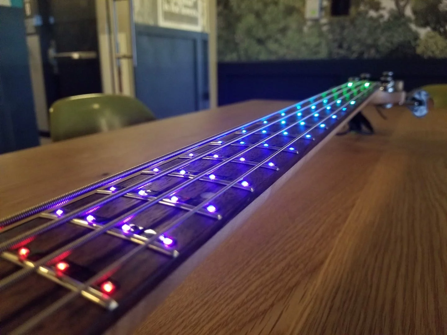 The Fret Zealot for Bass lights up the fingerboard to show learner where and when to place fretting fingers