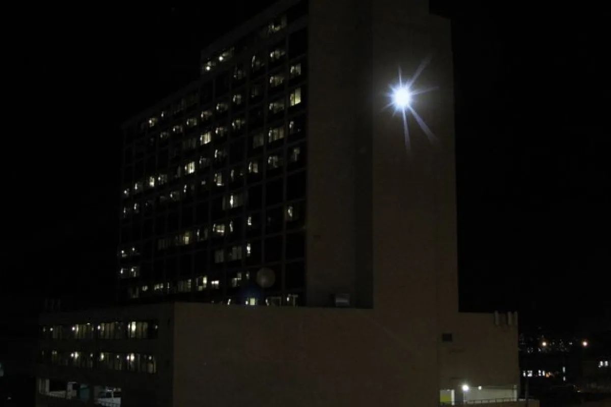 Adam Frank's SUNLIGHT at its peak, on the side of Denver's Minoru Yasui Building