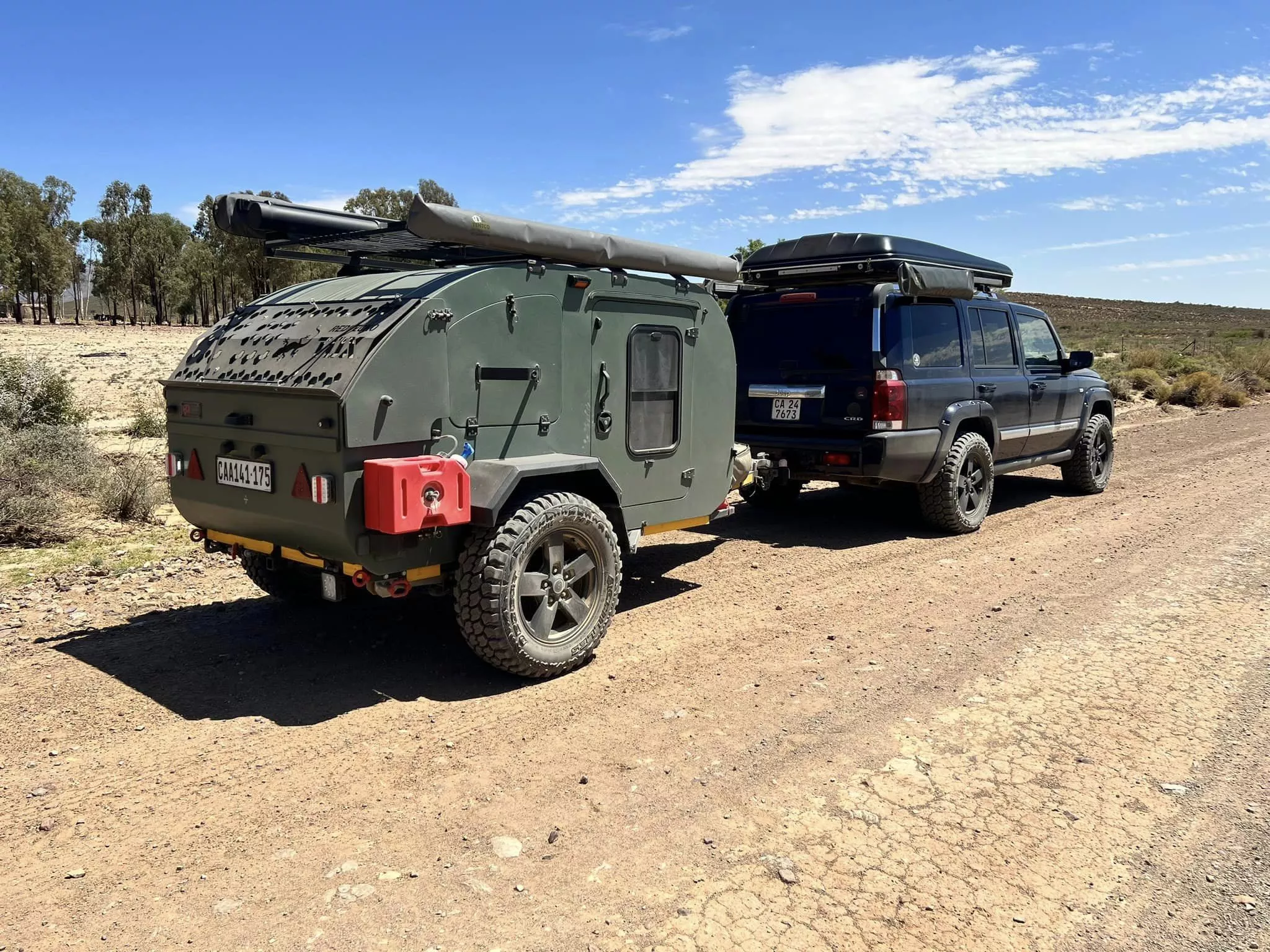 Tough, bush-ready features include a rectangular-tube steel chassis, all-terrain tires, step-on fenders and a steel-reinforced roof