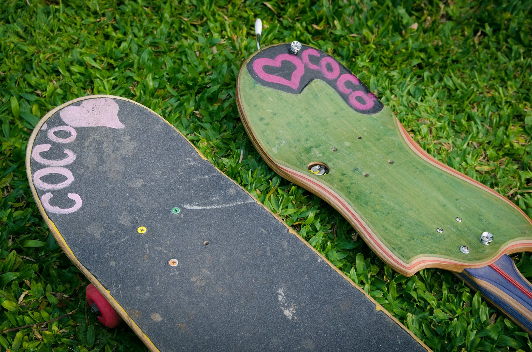 A skateboard and Skate Guitar side by side