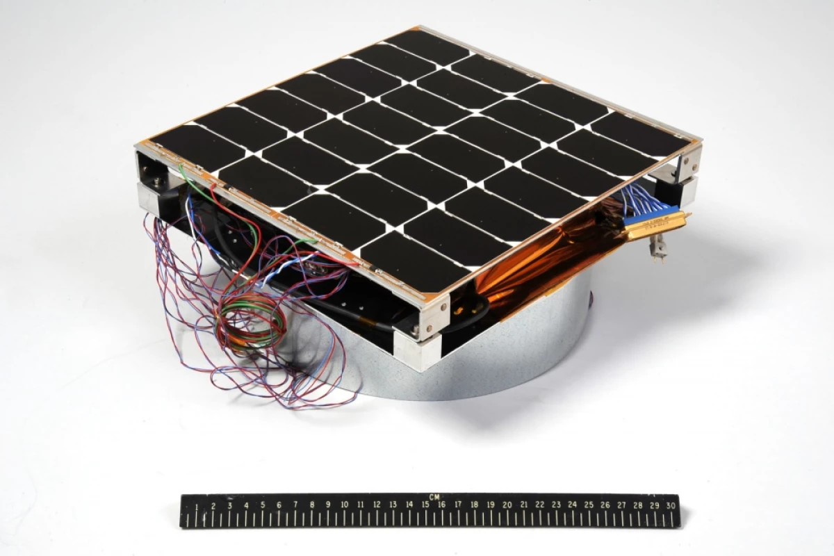 The Photovoltaic Radio-frequency Antenna Module (PRAM) that is designed to convert sunlight into microwaves for power transmission, with a 12-inch ruler for scale