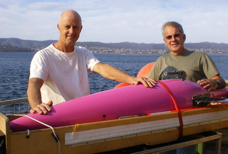 CSIRO's Lindsay MacDonald and Ken Ridgway with a deep ocean glider – one of the new tools giving scientists access to more deep ocean data. Image credit