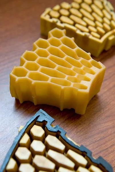 Molds and the resulting design for an early prototype of a non-pneumatic tire