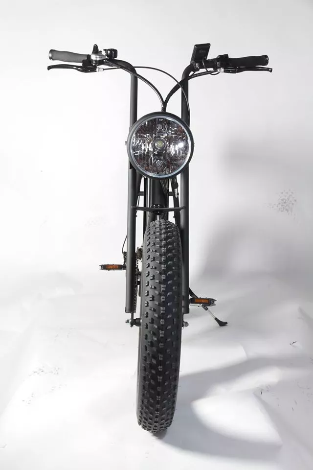 Another defining feature of the Moke is its large, metal headlight