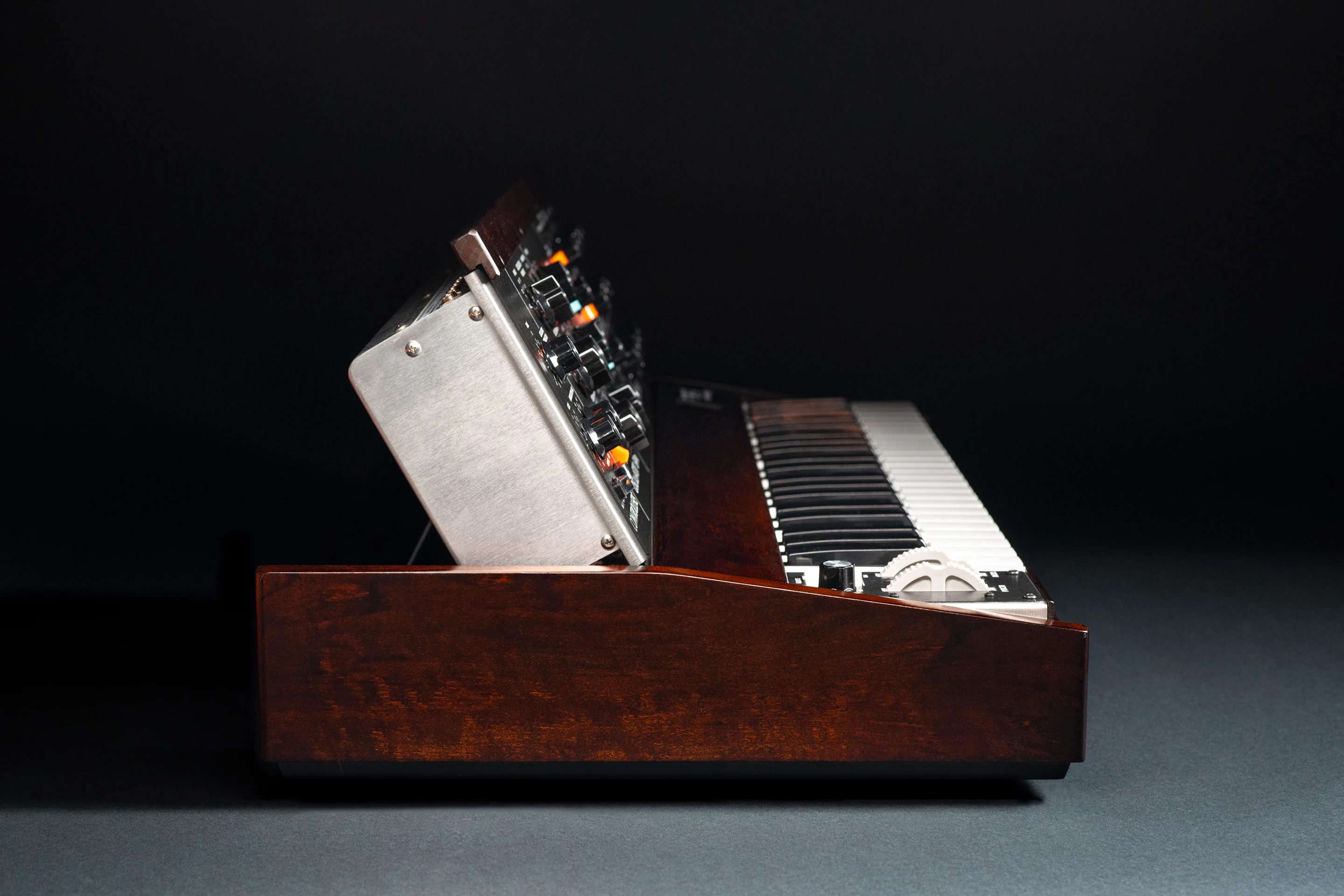 The 2022 Minimoog Model D reissue is housed in an Appalachian cherry cabinet with a walnut stain that's supported by a hand-finished aluminum chassis