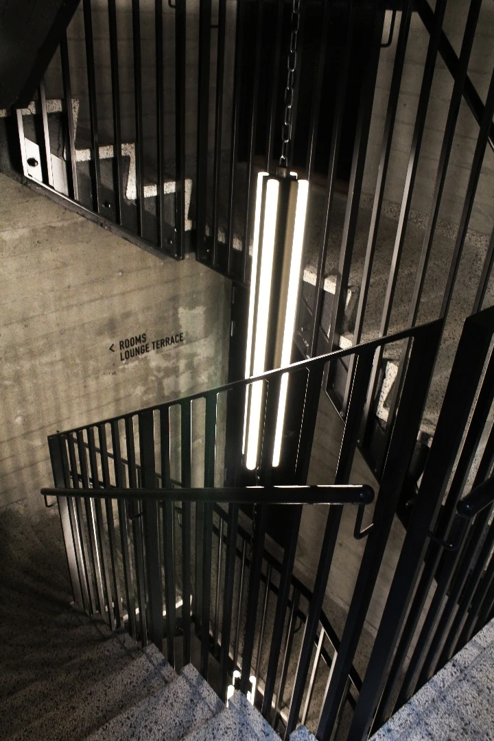 The industrial theme of the Hotel Herman K continues indoors with exposed concrete surfaces