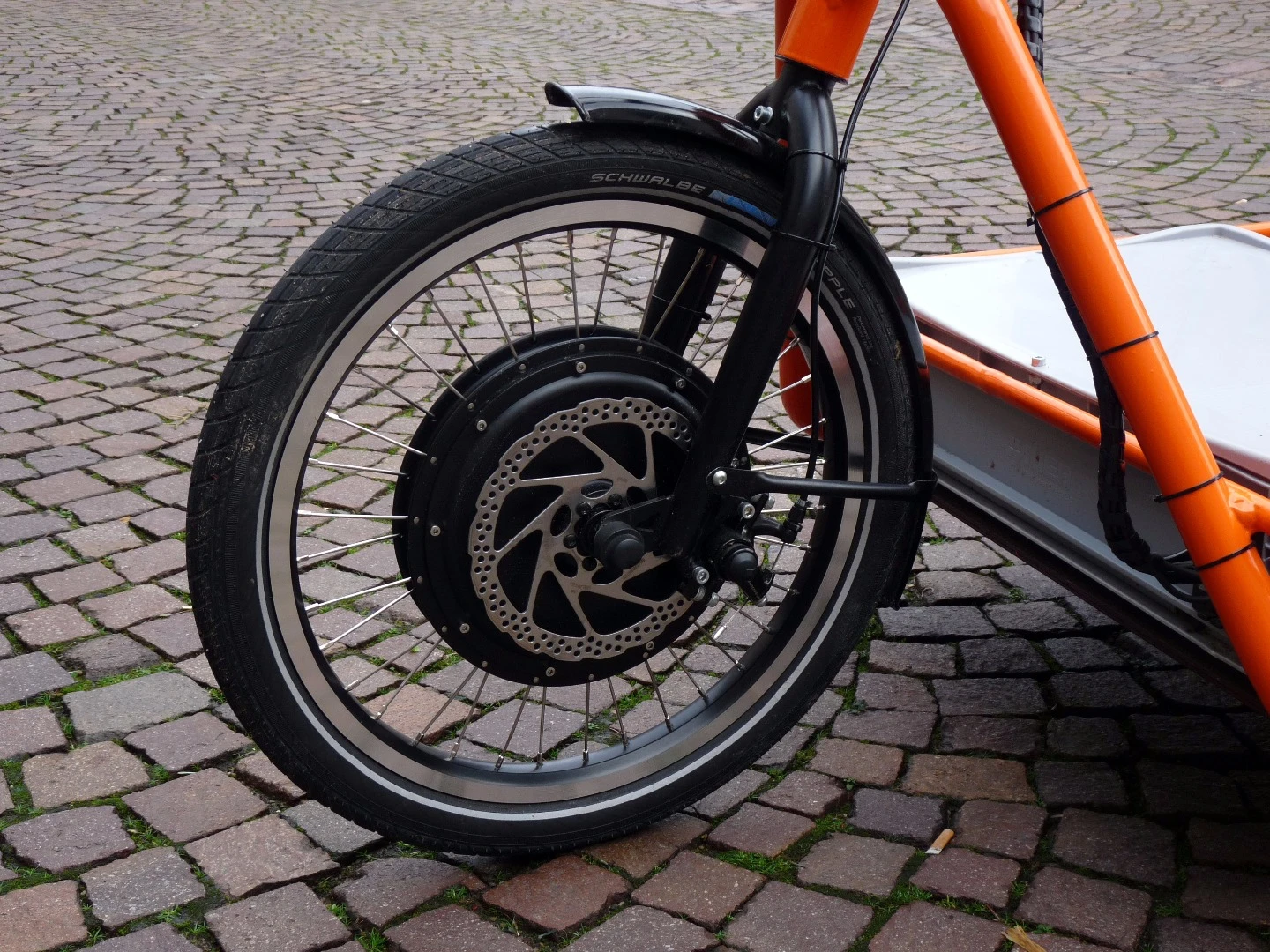 The front hub motor provides drive power while dual discs deliver stopping power