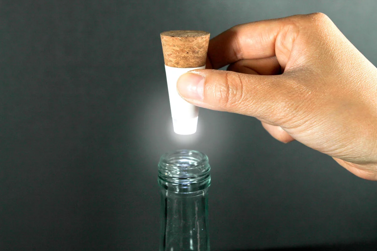 You twist the LED to turn it on, then stick the bottlelight in the top of a wine bottle
