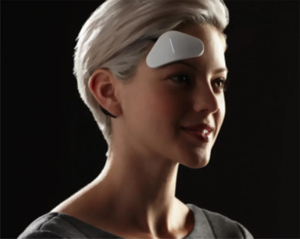 Thync press shot, showing someone who actually has hair using it