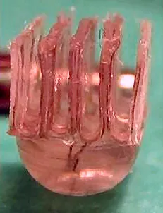 The active electrode book - the four slots close in around the nerve roots like the pages of a book