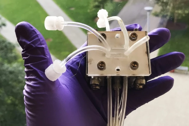A small-scale device, seen here, was used in the lab to demonstrate the effectiveness of the new shockwave-based system for removing radioactive contaminants from the cooling water in nuclear powerplants