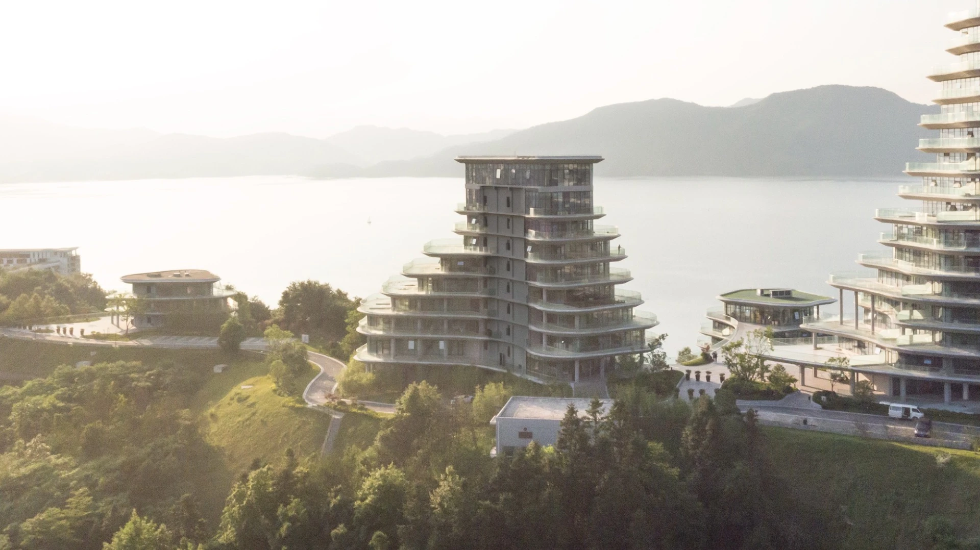 The Huangshan Mountain Village's cluster of residential buildings consist of apartments conceived as quiet retreats, each boasting an expansive balcony