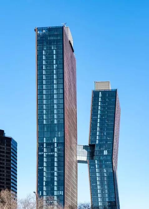 The American Copper Buildings are connected by a sky bridge which includes amenities like a lap pool and hot tub