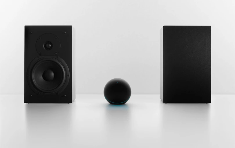 The Nexus Q has a 25 W amp for connecting a couple of bookshelf speakers