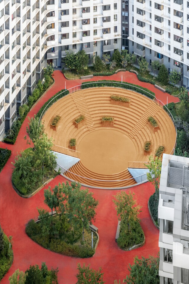 Baiziwan Social Housing's extensive landscaping includes multiple park-like areas, including an amphitheater