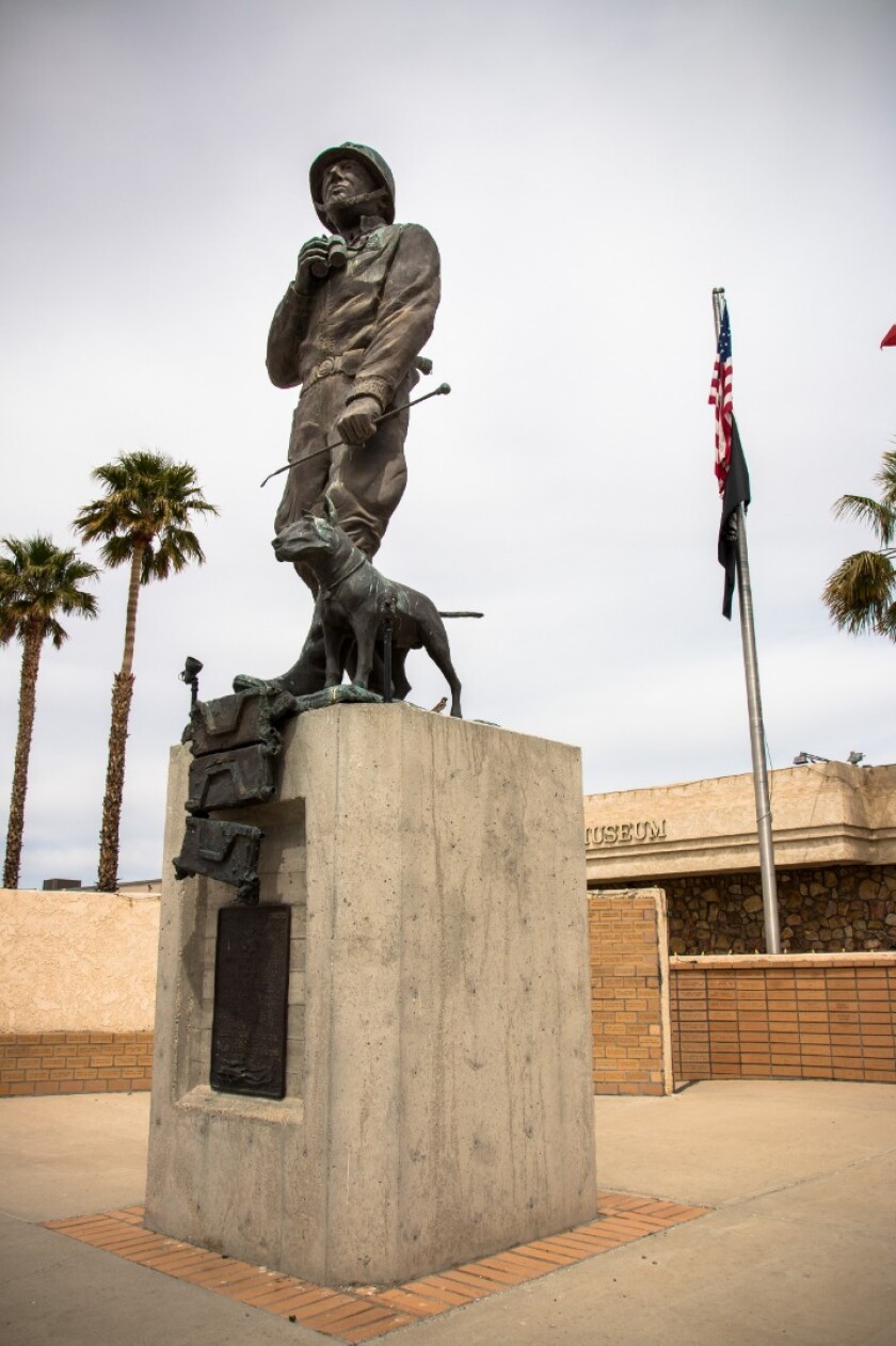 Out front stands a statue of General George S. Patton, with his Bull Terrier named Willie