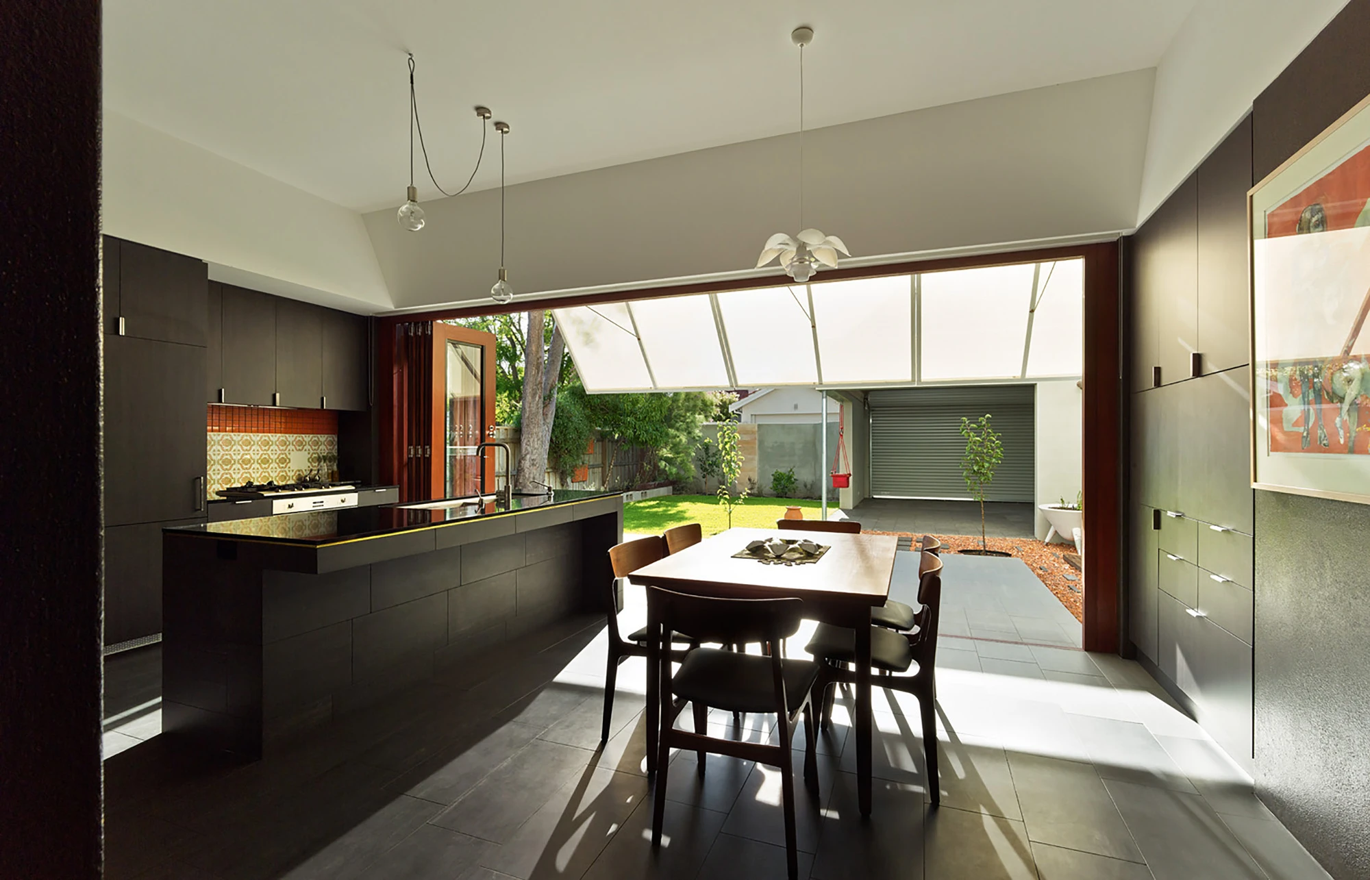 The kitchen opens onto the garden (Photo: Peter Bennetts)