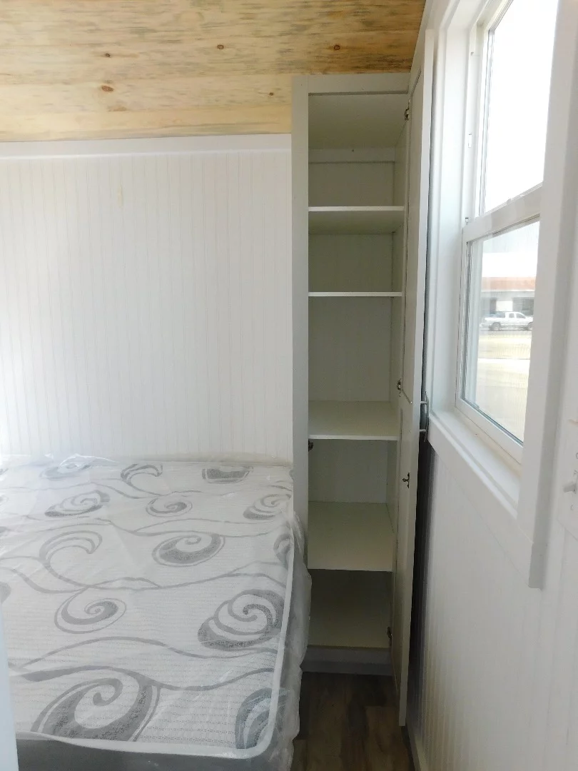 The Ozark's bedroom includes a queen-sized bed