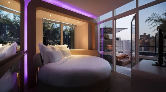 The New York Yotel, for example, features a bed that transforms into a space-saving lounging position at the touch of a button (Image: Yotel)