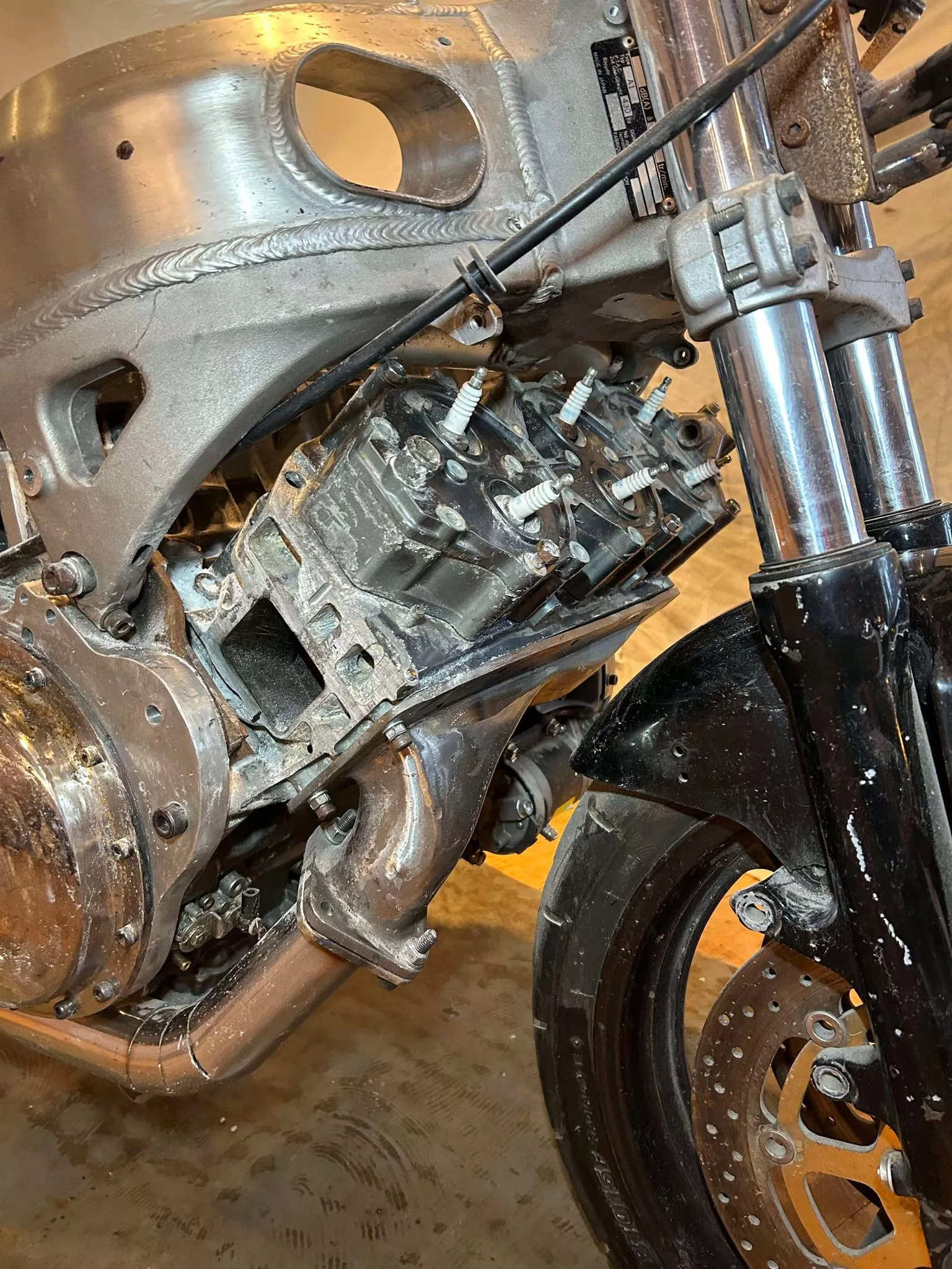 A pair of primary drive gears drive a transverse jackshaft carrying a third gear to drive a stock GSX1400 clutch and gearbox